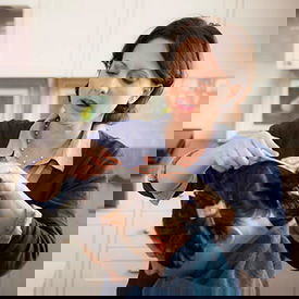 do it yourself treatment mom performing a do it yourself treatment for head lice