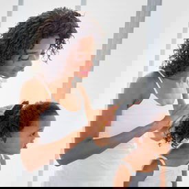 before head lice treatment brush through hair mom brushing daughters hair before head lice treatment