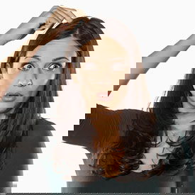 mom worried about head lice worried mom scratching her head because of head lice