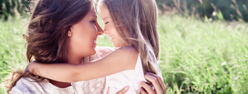 Mother and daughter are smiling together in Northern IL happy they do not have lice
